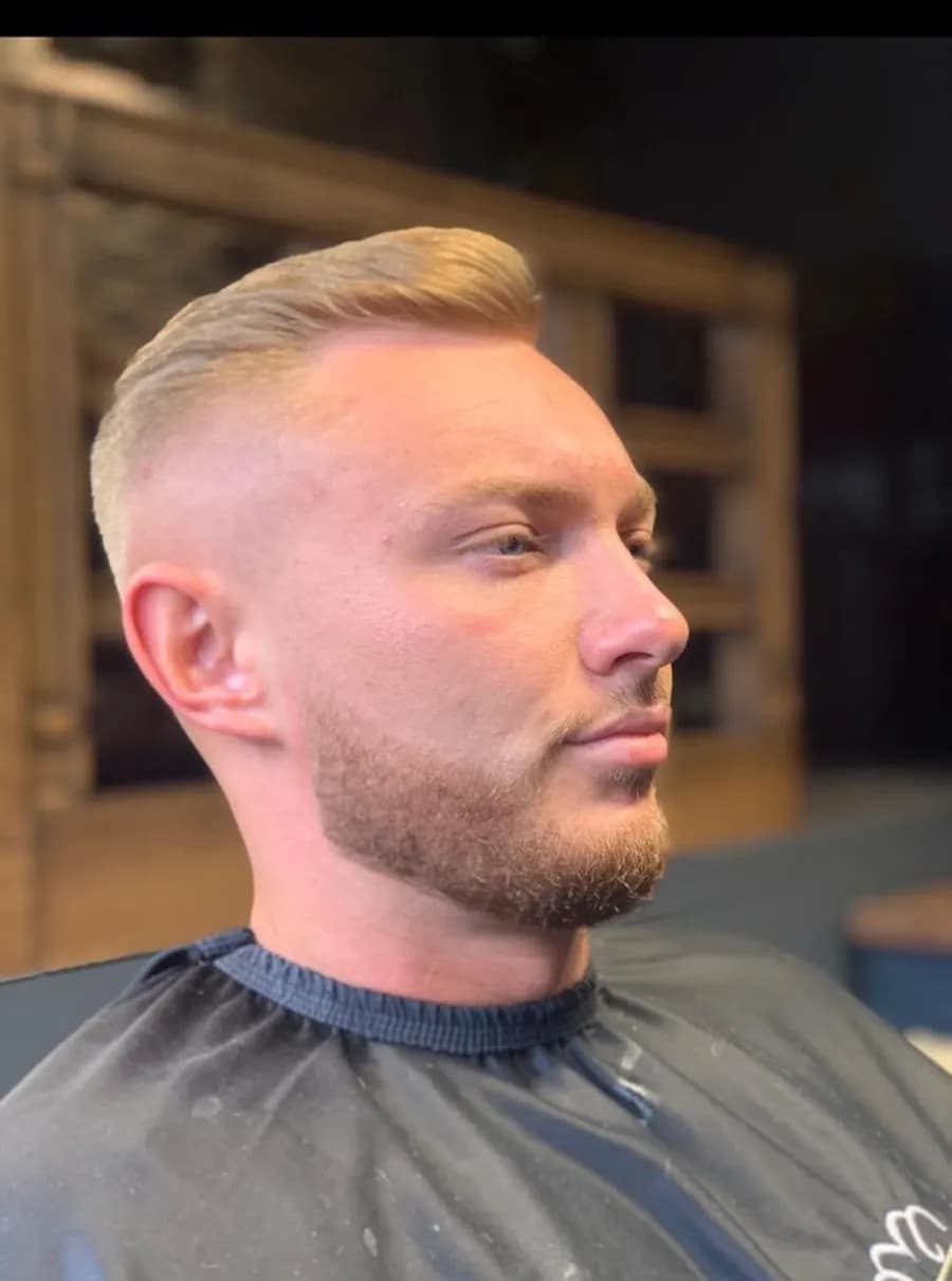 A side part with a faded back and sides